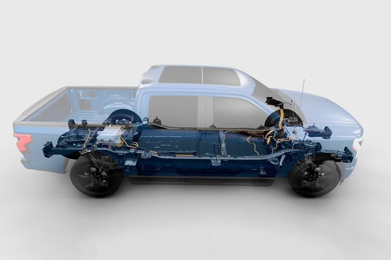 Illustration d’un camion Ford F-150 Lightning® 2025 montrant les deux moteurs