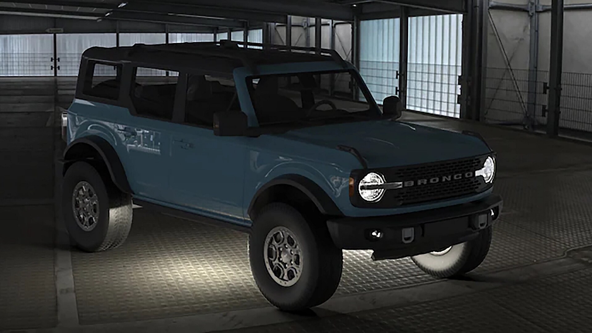 Un VUS Ford Bronco® 2025 dans une grange foncée, montrant un éclairage sous-éclairé en option
