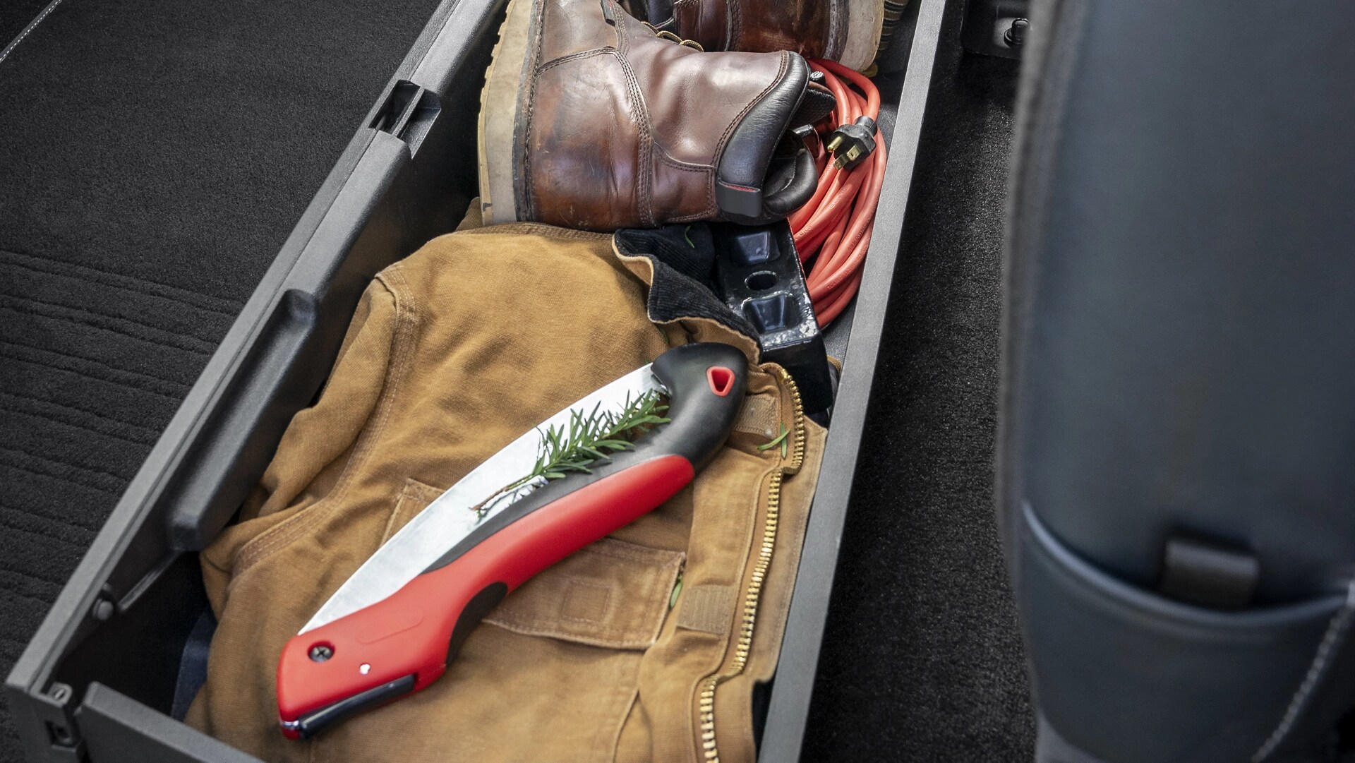 Rangement sous le siège du Ford Super Duty® à châssis-cabine 2026