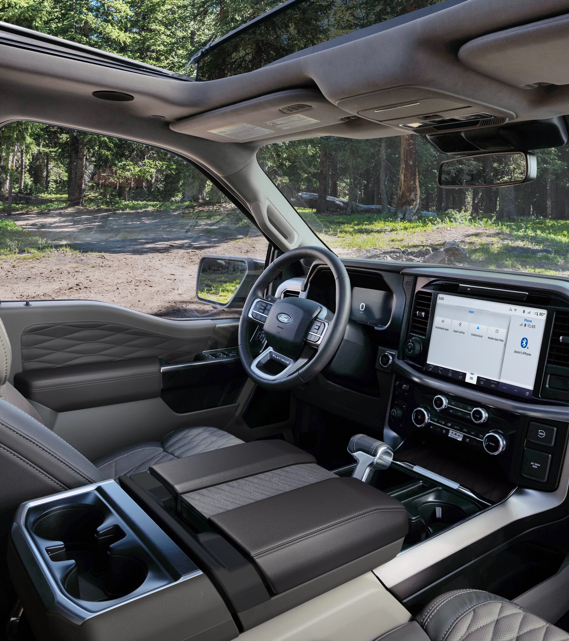 Intérieur d’un camion Ford F-150® Platinum® Plus 2025 montrant les sièges avant en cuir et la console centrale