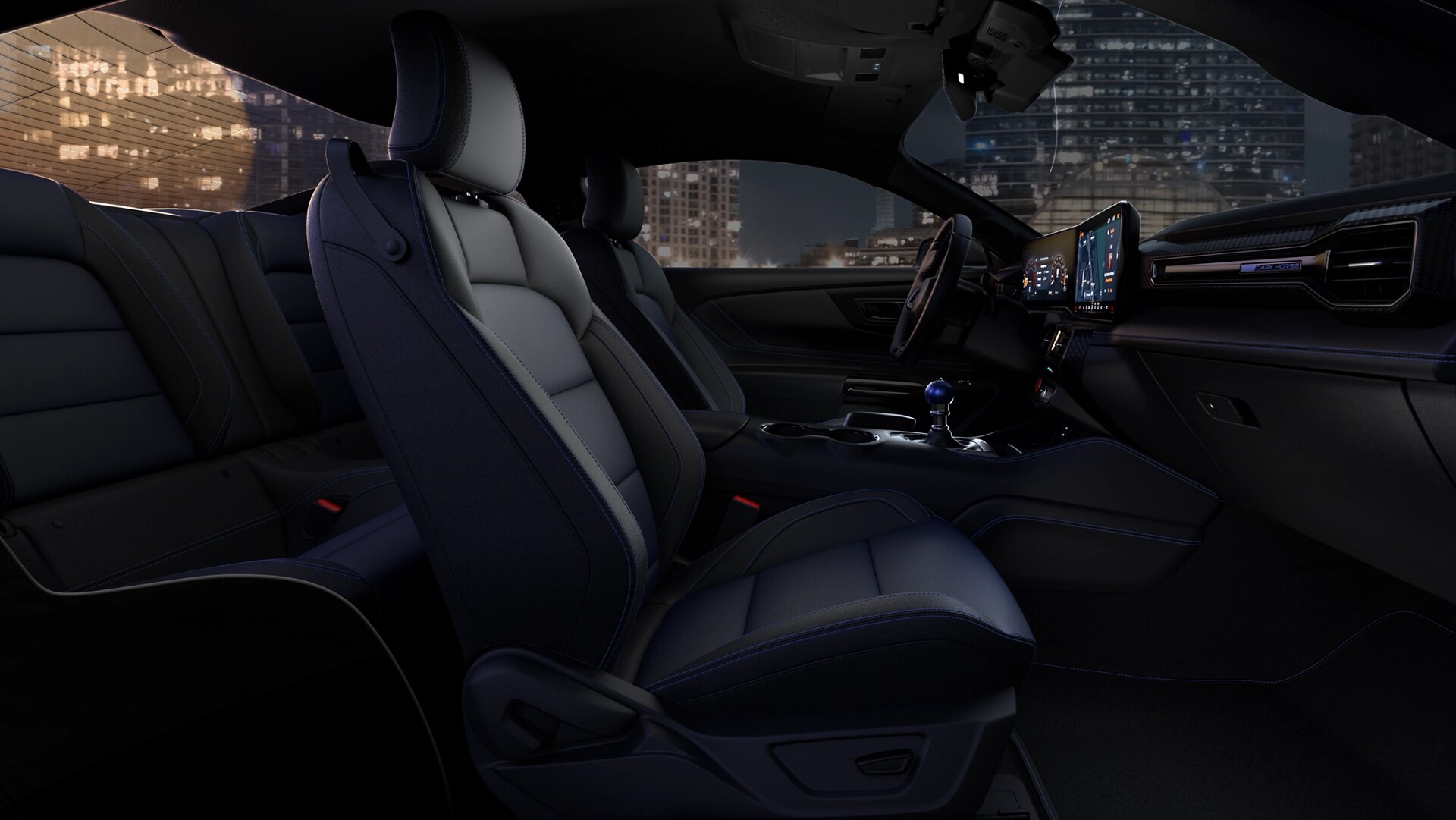 Intérieur de la Ford Mustang® Dark Horse™ 2025 montrant le tissu noir en option avec des accents bleus