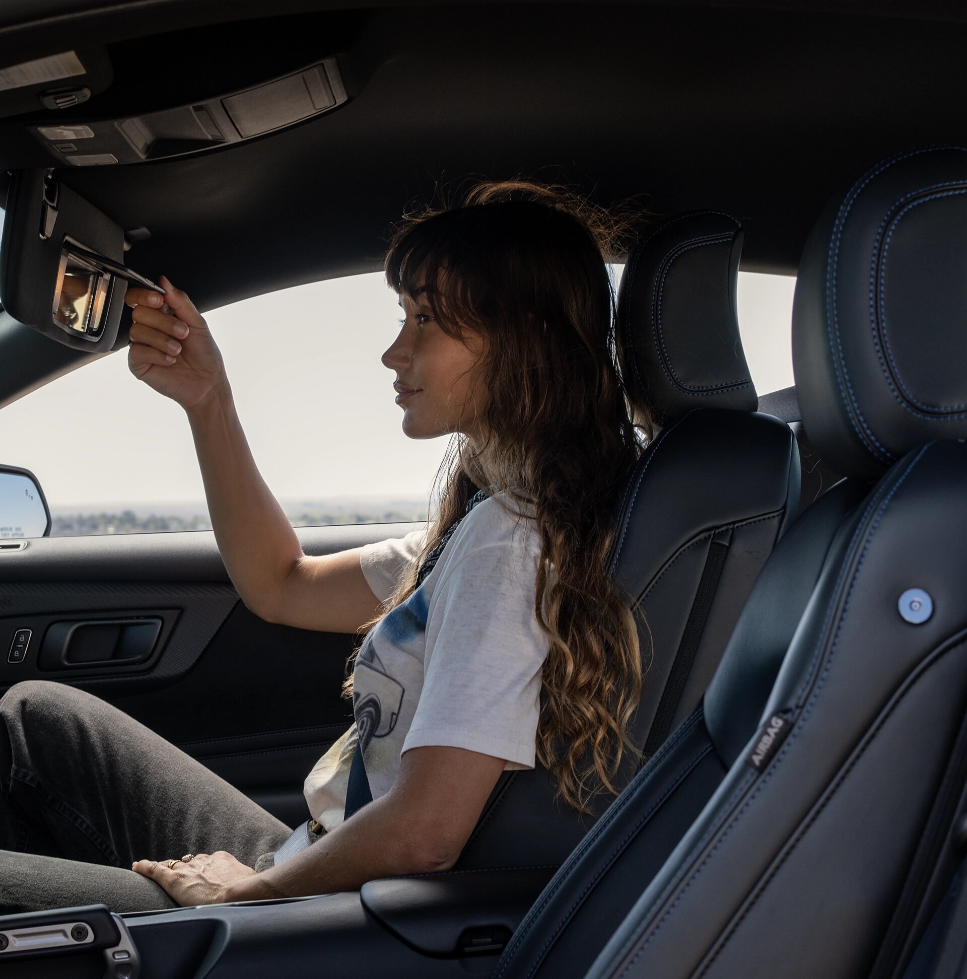 Une personne assise dans un modèle Ford Mustang® Coupé 2026