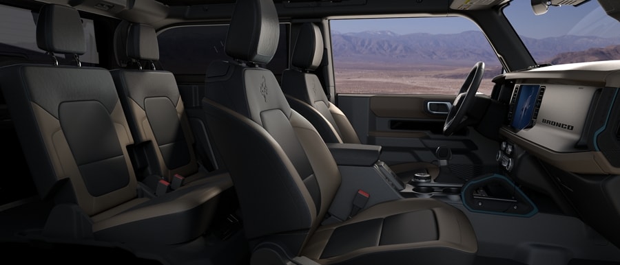 Intérieur des sièges du VUS Ford Bronco® 2024 avec garniture en cuir grès moyen et onyx noir