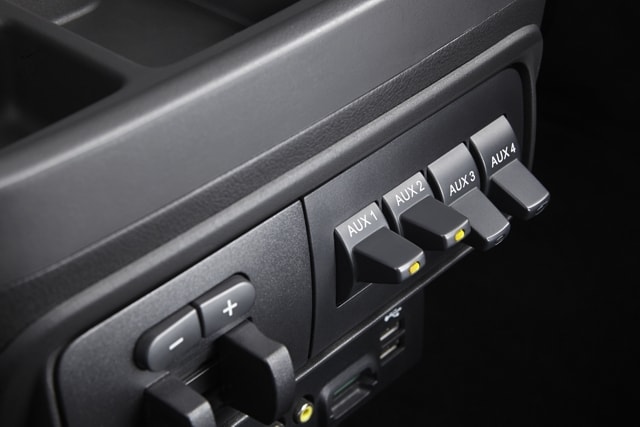 Gros plan sur les commutateurs du bloc de commande de grande capacité